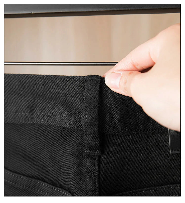Pure black jeans men's 2025 new light luxury fashion spring and summer versatile elastic slim fit small straight leg pants