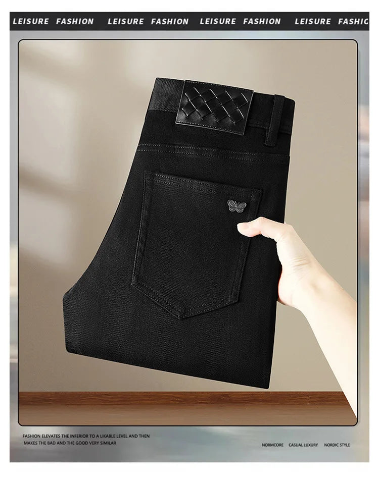 Pure black jeans men's 2025 new light luxury fashion spring and summer versatile elastic slim fit small straight leg pants