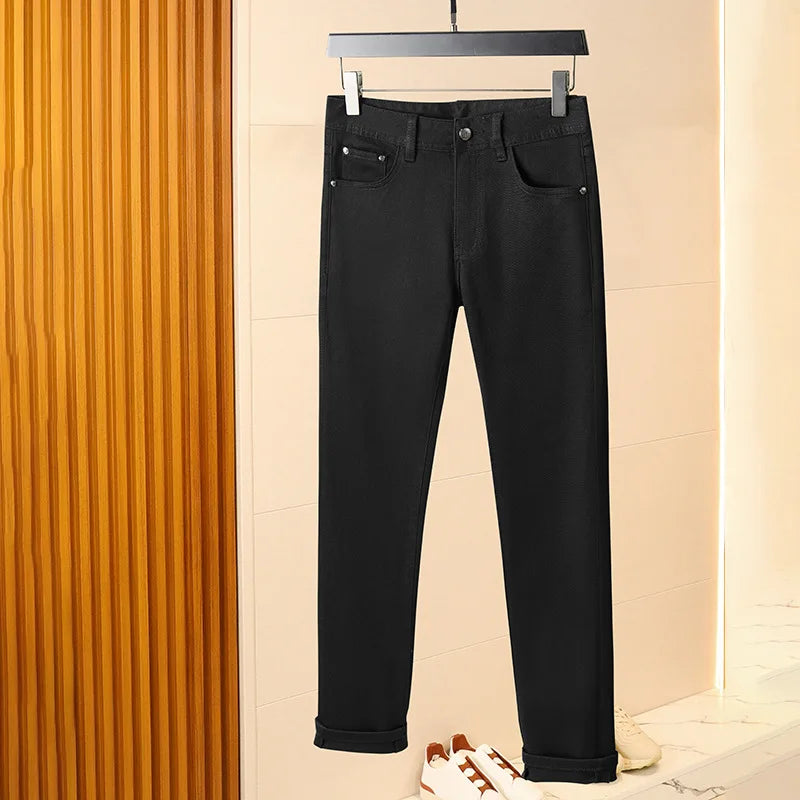Pure black jeans men's 2025 new light luxury fashion spring and summer versatile elastic slim fit small straight leg pants