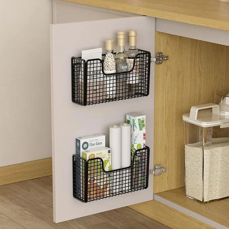 Storage box inside the kitchen cabinet door, storage bag on the hook behind the door, basket for the cabinet door
