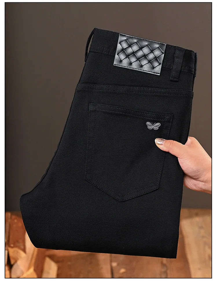 Pure black jeans men's 2025 new light luxury fashion spring and summer versatile elastic slim fit small straight leg pants