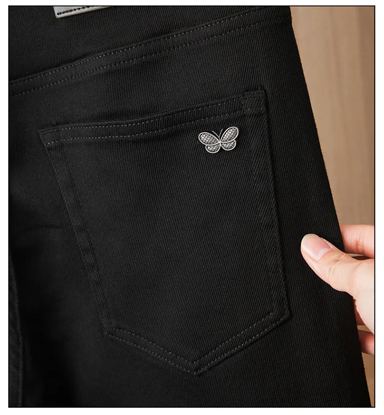 Pure black jeans men's 2025 new light luxury fashion spring and summer versatile elastic slim fit small straight leg pants