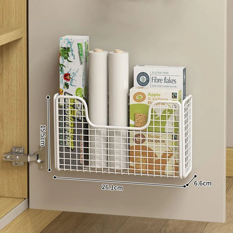 Storage box inside the kitchen cabinet door, storage bag on the hook behind the door, basket for the cabinet door