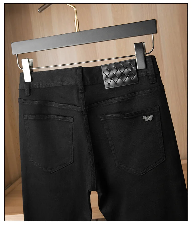 Pure black jeans men's 2025 new light luxury fashion spring and summer versatile elastic slim fit small straight leg pants